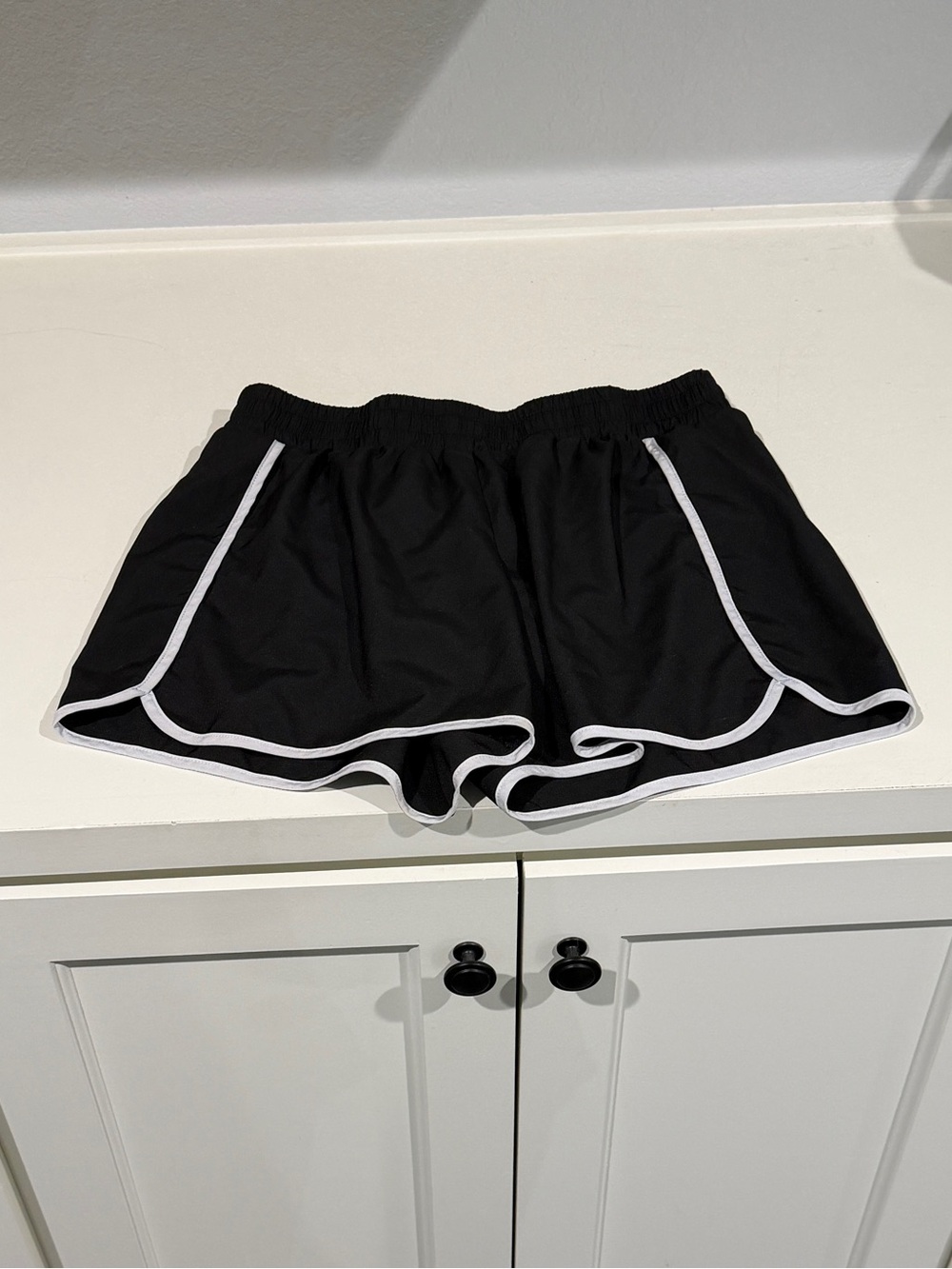 Pink Lily Black Athletic Dolphin Shorts with White Piping